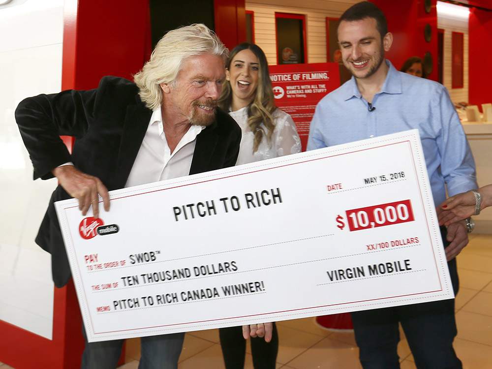 Proof : Richard Branson with a very large cheque